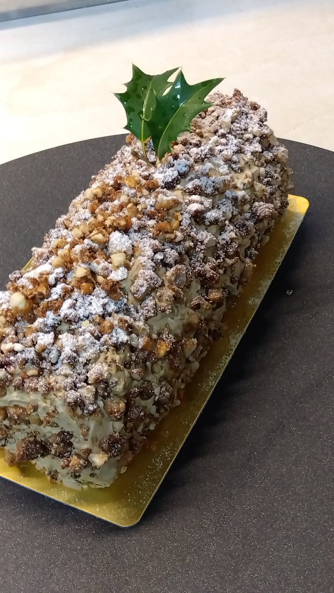 This year’s Bûche de Noël: mocha cream with rum-soaked raisins, topped with caramelized hazelnuts.😋