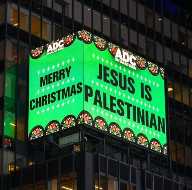 🚨 A billboard in New York’s Time Square.  

“Merry Christmas.   Jesus is Palestinian”