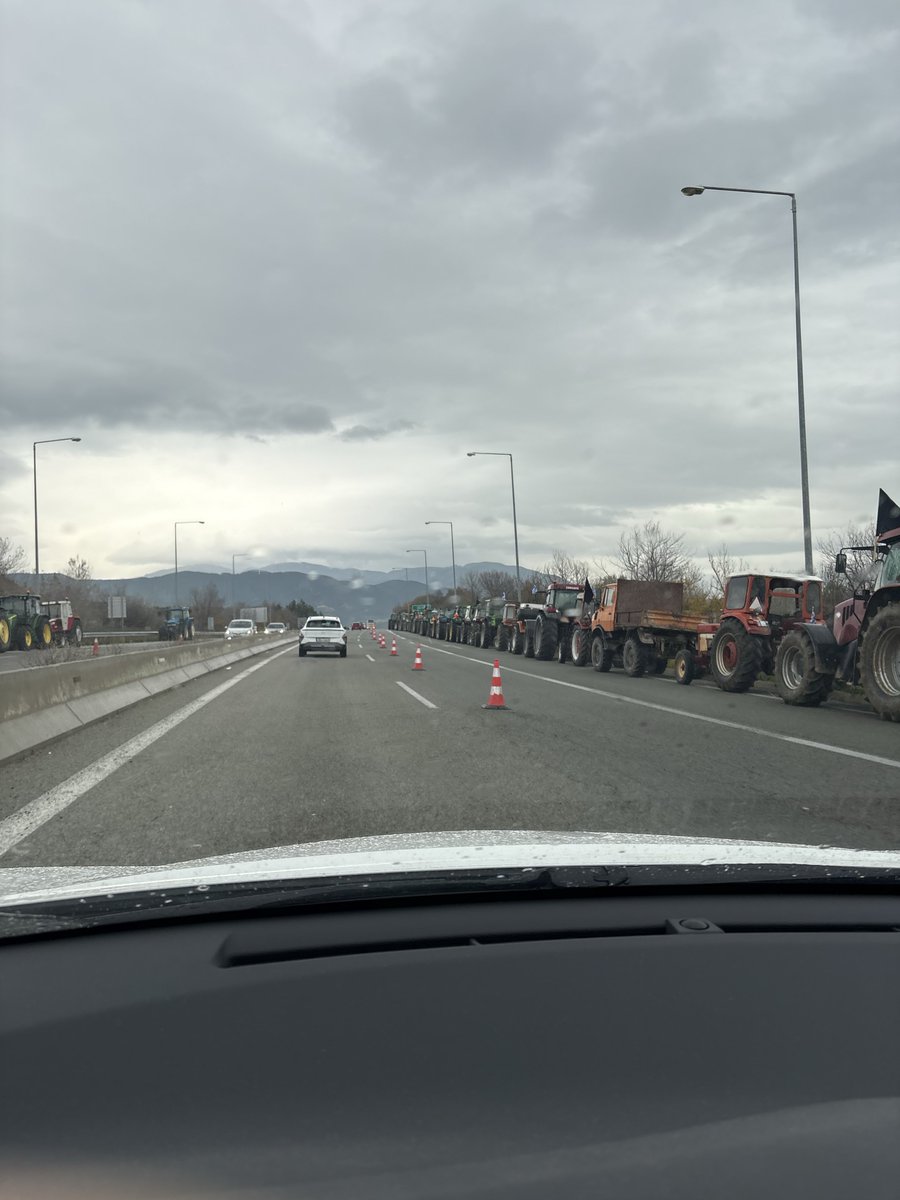 Greek farmers opened the greek highway today due to Christmas. They even took over the toll station and made it free. #farmers #fucktheEU
 #greekfarmers