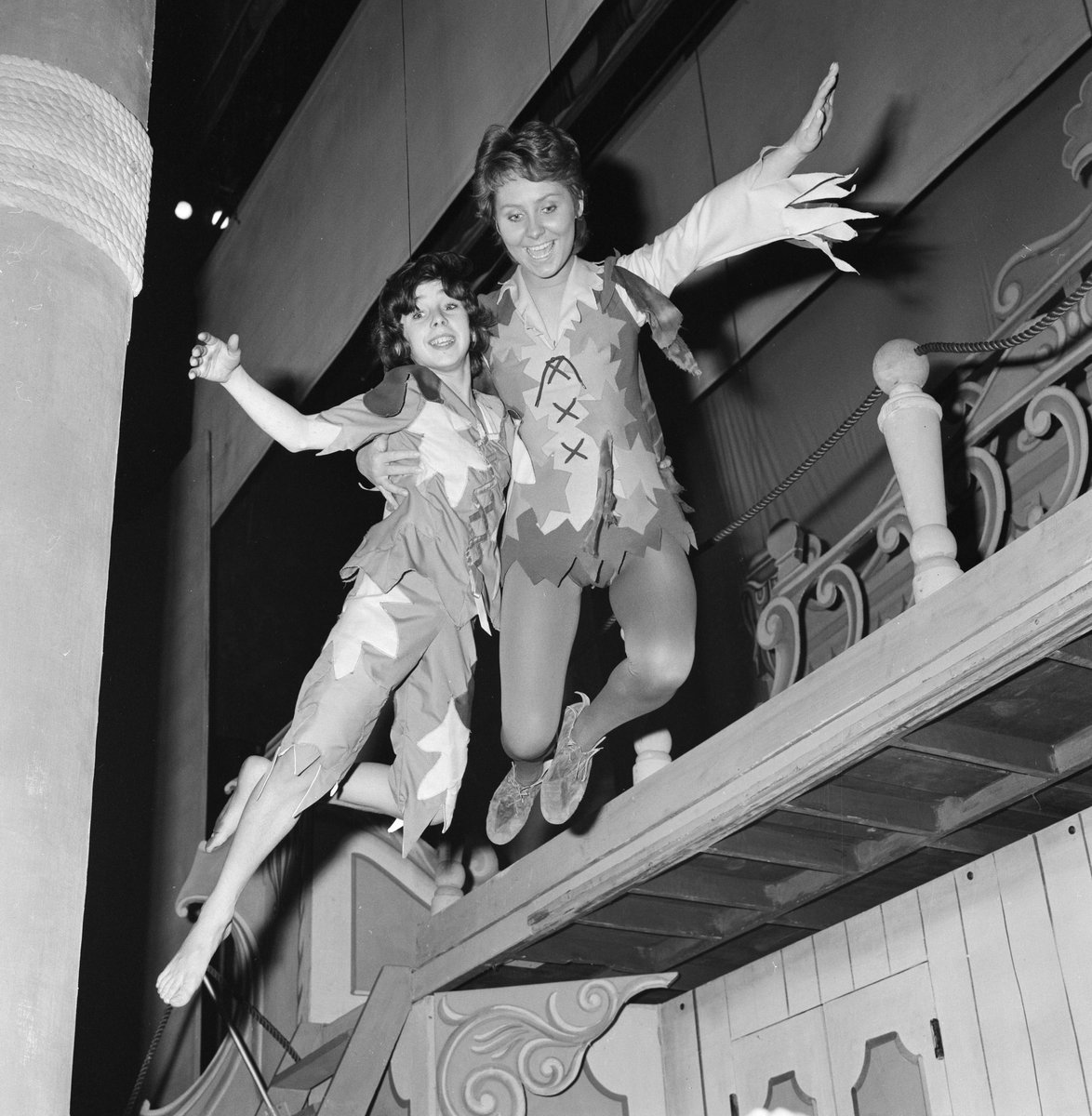 Day 4 of #PantoChristmas: Manchester Opera House, 1972! 🧚✨
Relive the magic as pop icon Lulu takes flight in rehearsals for ‘Peter Pan.’
Joining her in the clouds is 13-year-old Manchester local Simon Thompson, playing Michael Darling!  
<a href="/mirrorpix/">Reach Licensing</a>