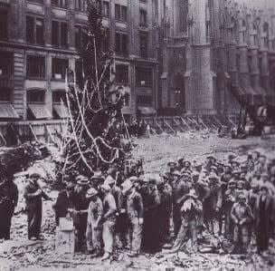 Today in History
December 24th Christmas Eve
1931...The first Christmas tree goes up in Rockefeller Center. Workers building the new complex gather to collect their paychecks in front of the impromptu holiday tree at Fifth Avenue. #OTD