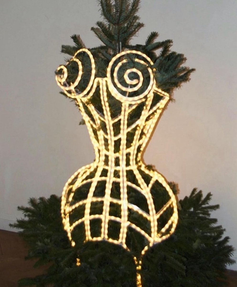 dearvotion's tweet image. Thinking about Jean Paul Gaultier’s cone bra corset Christmas tree.