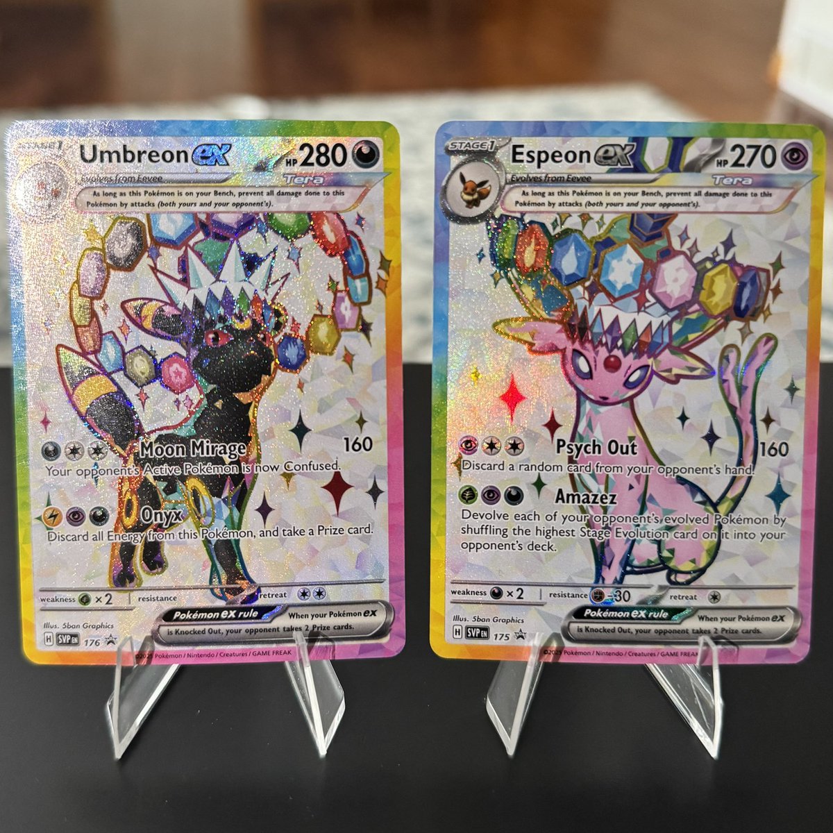 pokenatt's tweet image. Giving away an Umbreon &amp;amp; Espeon promo 👑 to one lucky person!🩷

All you have to do is: 
🩷 Follow: @pokenatt 
🩷 Like &amp;amp; Retweet!
🩷 Tag a friend ✨

Winner will be announced January 2nd! US ONLY. Good luck🥳🩷