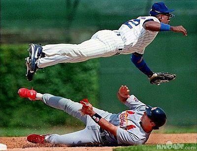 Shawon Dunston flying against the Cardinals. Photo by Damian Strohmeyer. A perfectly timed photo.