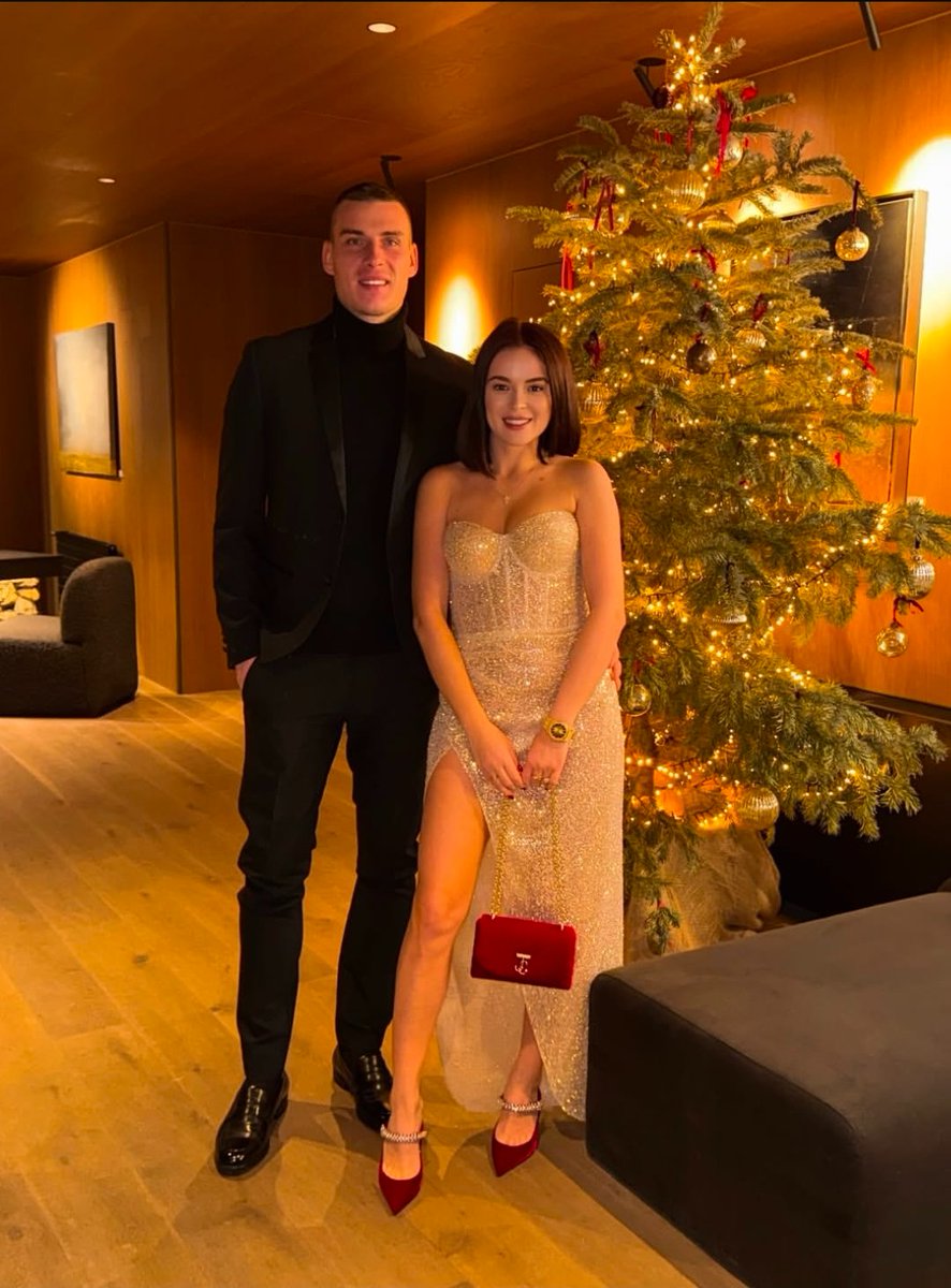 Lunin with his wife. 🤍🎄
