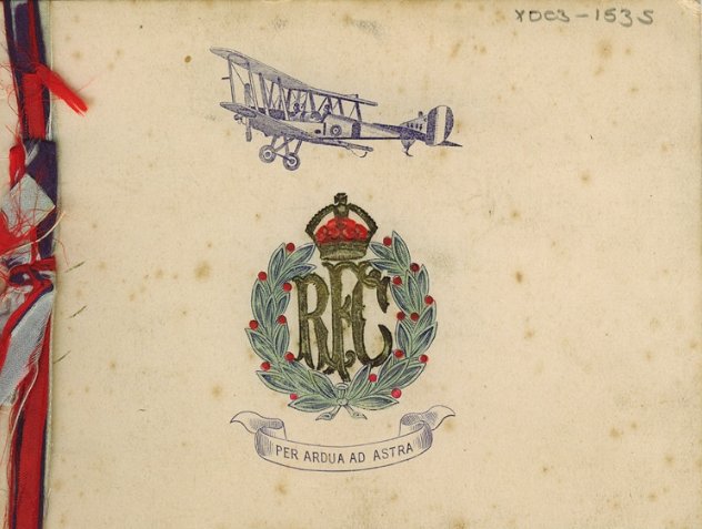 Royal Flying Corps Christmas card 1916. Features the RFC cap badge and motto 'Per ardua ad astra', meaning 'Through adversity to the stars.'