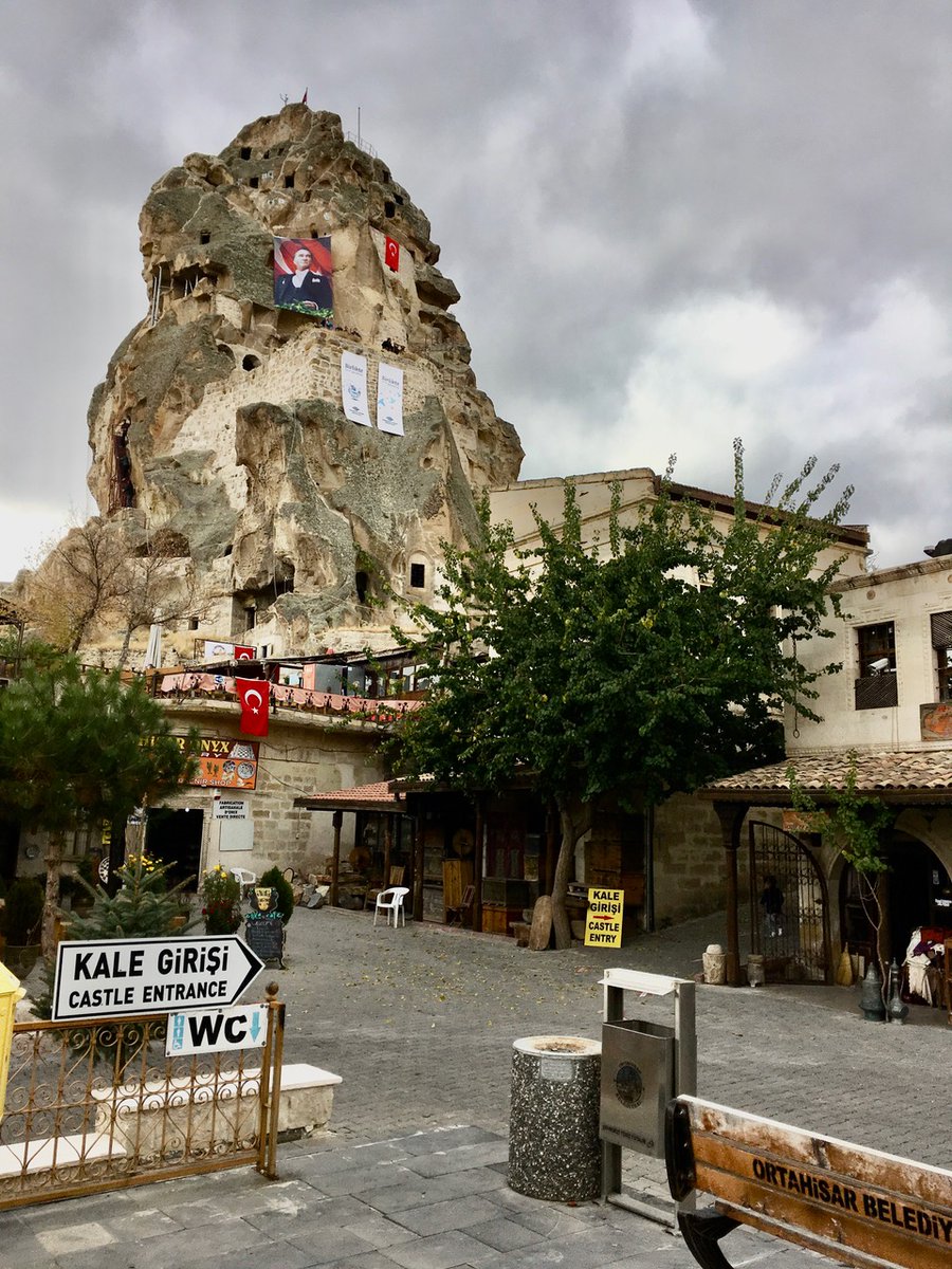 One of our intrepid team paid a visit to Göreme national park,  Türkiye. Here we see the imposing Uçhisar Castle -- and a prominent sign for a public toilet!
