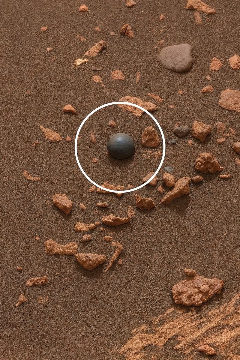 ???
A perfect sphere on Mars? 🔵
NASA’s rover spotted this unusually smooth, almost manufactured-looking ball sitting alone in the Martian dust.
Natural formation… or something far more engineered?”