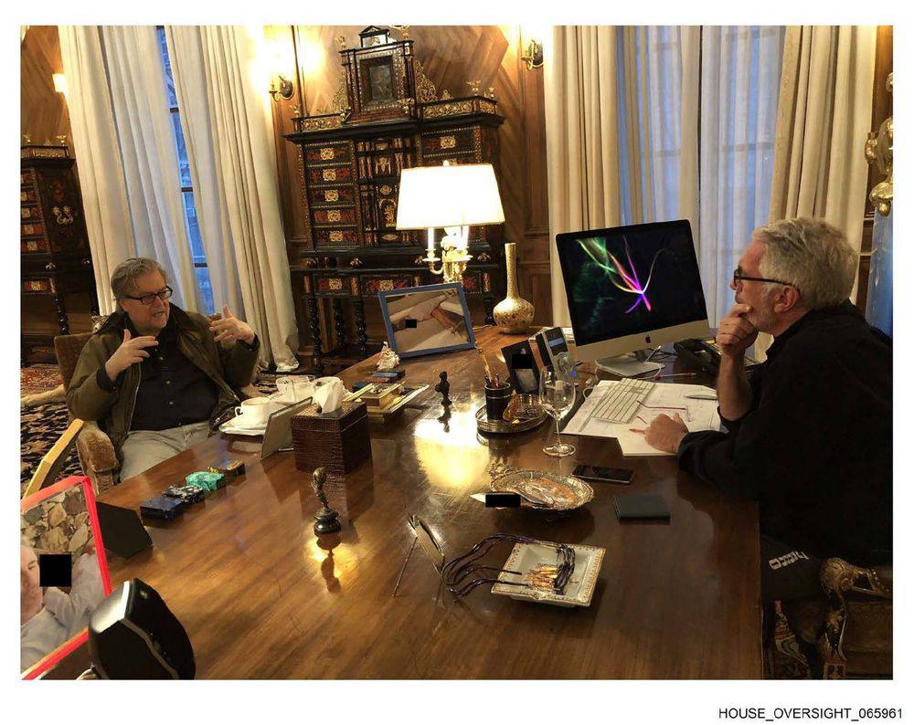 xIsraelExposedx's tweet image. In one of the newly released images from Jeffrey Epstein's island, during a meeting between Epstein and Steve Bannon, you can see an image frame depicting a passed out or drugged underage woman laying on a couch