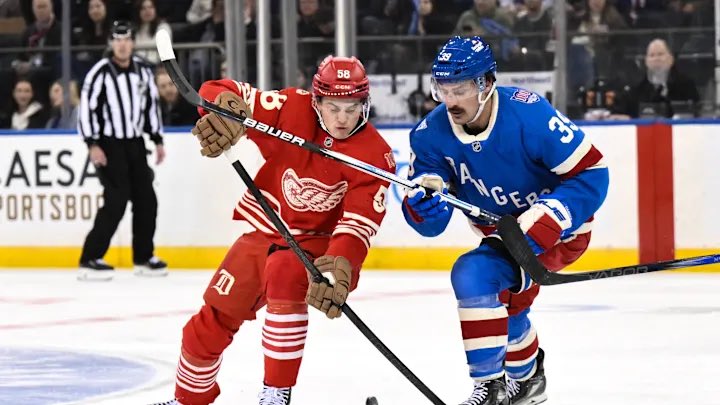 thracer's tweet photo. @m_millsey Detroit Red Wings and New York Rangers both wore their home throwbacks in a recent game - no white jerseys.  Detroit even used the old school brown leather color on all their gloves and goalie pads 😍 https://t.co/h2KUO27aIv