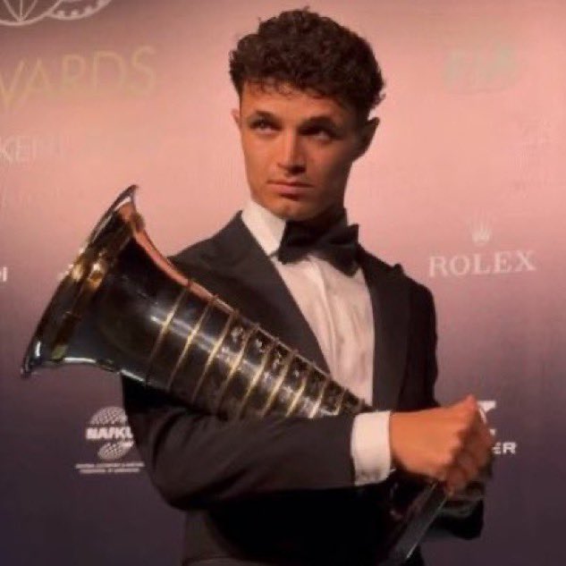 formula__fuck's tweet photo. how lando be moving with his wdc trophy https://t.co/AtG8JvoAEY