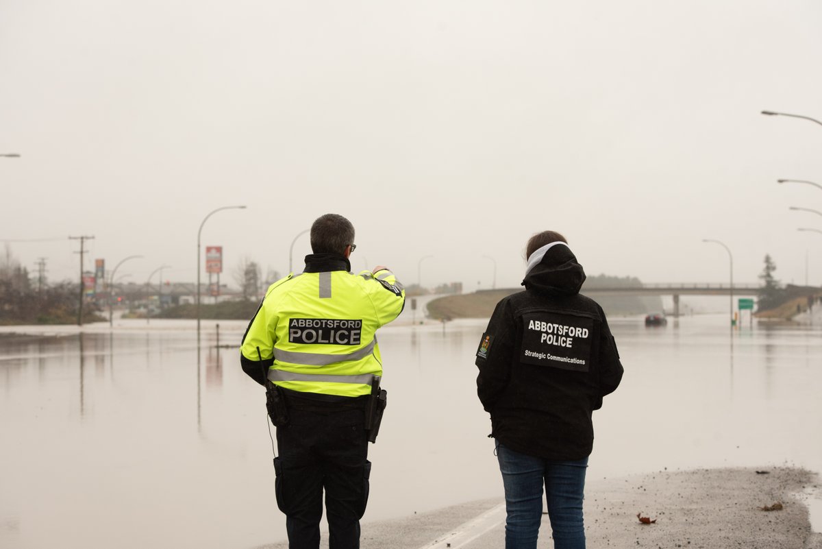 AbbyPoliceDept's tweet photo. Good morning, Abbotsford!

We wanted to share a few photos from yesterday’s (Friday) daytime conditions and police operations. Later this morning, Sergeant Walker will provide a video update covering what happened overnight and the current status of Highway 1 through Abbotsford. https://t.co/wT6Jg8ZPQ1