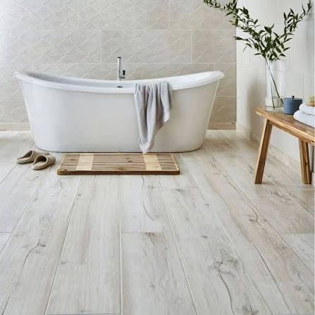 7. Small Bathroom Floor Tiles

Too many joints, more dirt and harder cleaning.

✔️ Use long planks or large tiles with fewer joints.