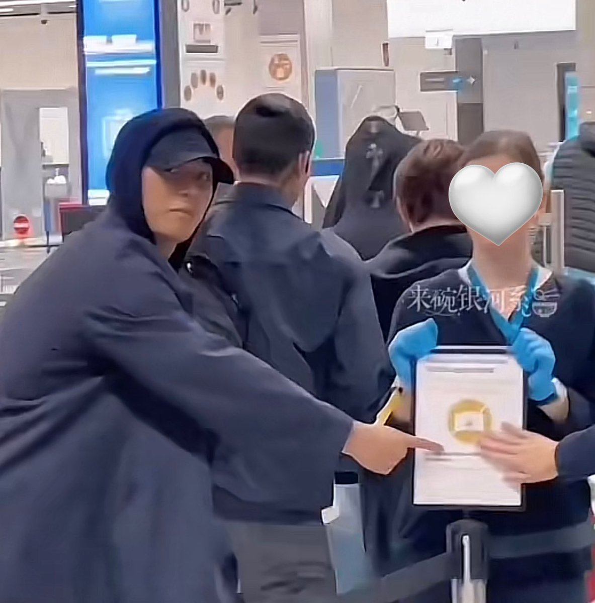 rdmcart's tweet photo. when mingyu pointed out the no photos sign in the immigration bc people keep on using their cameras https://t.co/GKlP8bVT94