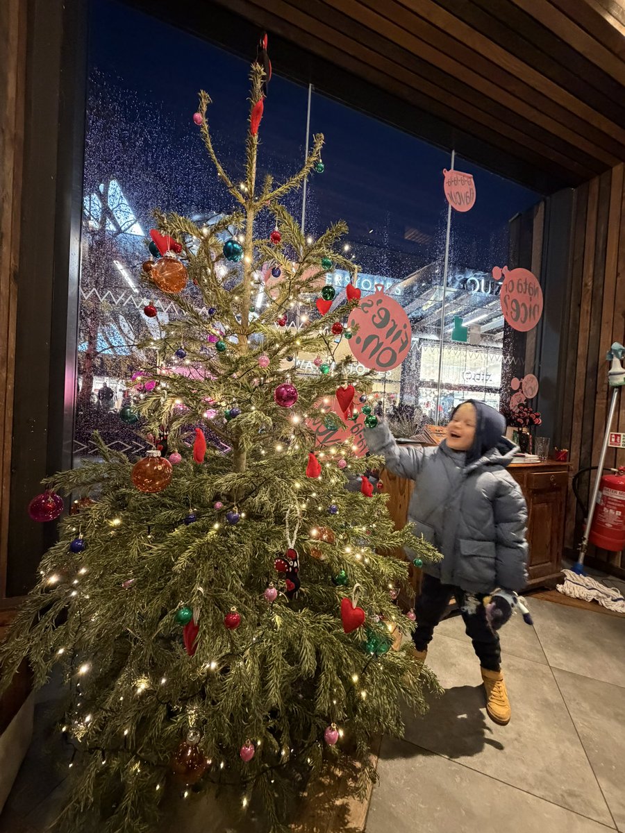 banner_pixie's tweet image. When your son loves the Christmas tree in @NandosUK