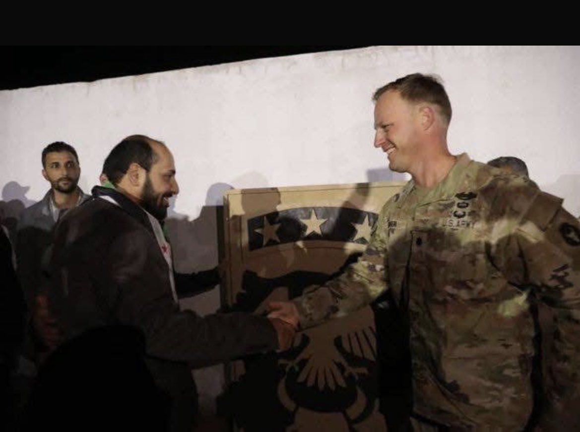 Unconfirmed reports that the bodyguard of the man pictured here (Abu Jaber - an HTS fighter close to Jolani) is responsible for today’s deadly attack on US troops in Palmyra
