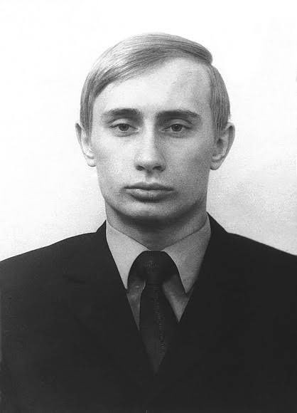 A 22-year old Vladimir Putin in 1975 after joining the KGB as a counter-intelligence operative. 

He was later posted to East Germany where he worked until the fall of the Berlin Wall in 1989. 

He returned to Russia and began work at Leningrad State University before he was