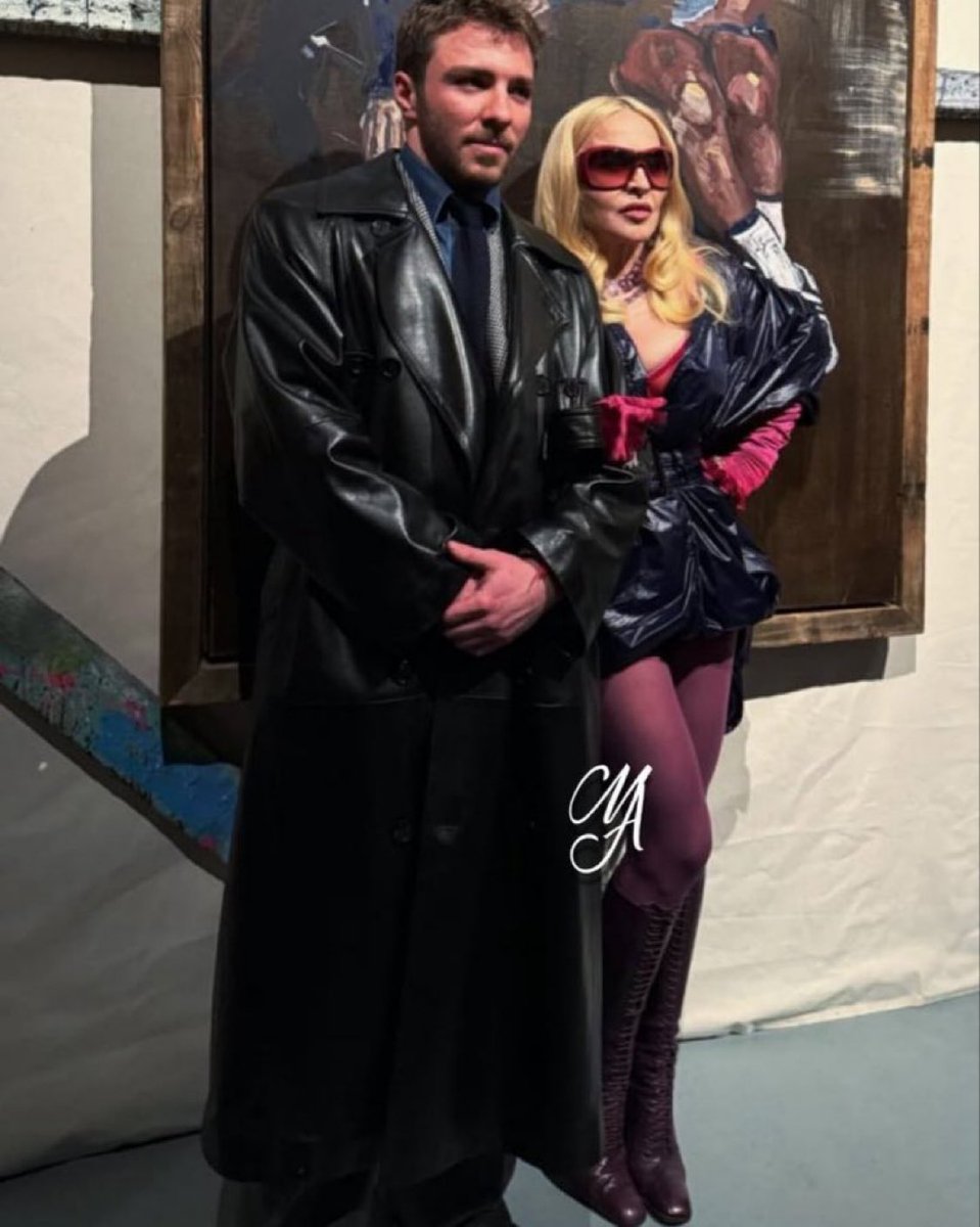 m_scrapbook's tweet photo. Madonna and son Rocco Ritchie at his art show last night. https://t.co/RbT4qonHQ6