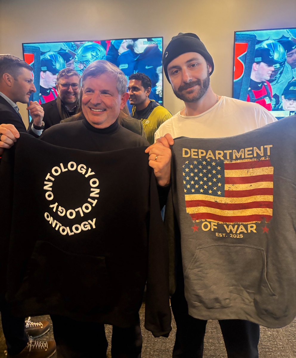 eliano's tweet image. Jersey swap with L3 Harris CEO Chris Kubasik