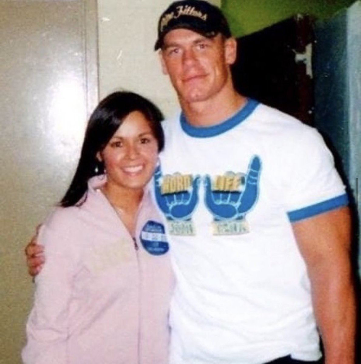 LizMPena's tweet photo. This photo marks the beginning of my career in @WWE , where I had the privilege of doing my first promo shoot with none other than @JohnCena #ThankYouCena https://t.co/rgP05qncf6