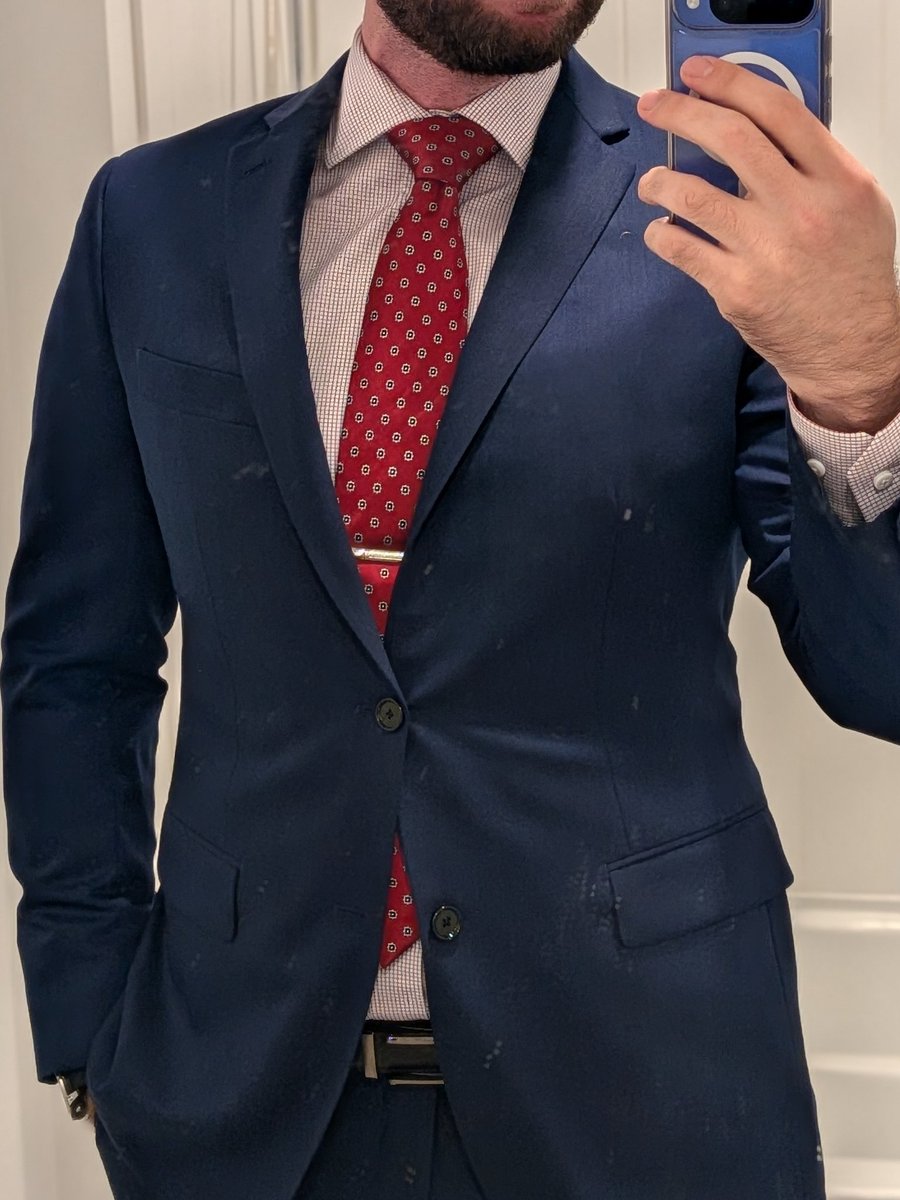 SuitVolatile's tweet photo. Wearing plug suit &amp; tie with a lock through the belt. Icy hot inside chastity belt &amp; on balls. Eyes covered. Vibrator tied to the crotch. 

Timer set to 60 minutes. What happens if I can't resist? https://t.co/7ZTK9Yc3Ih