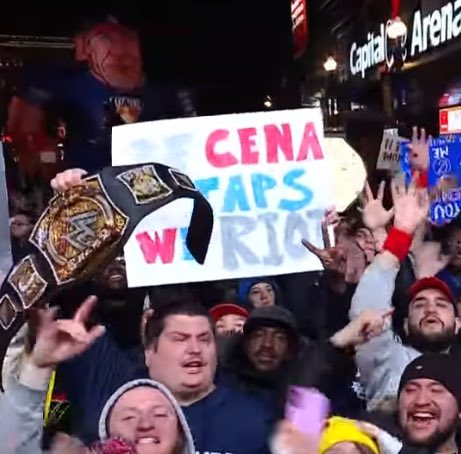 “If Cena taps We Riot” sign.

 #SNME