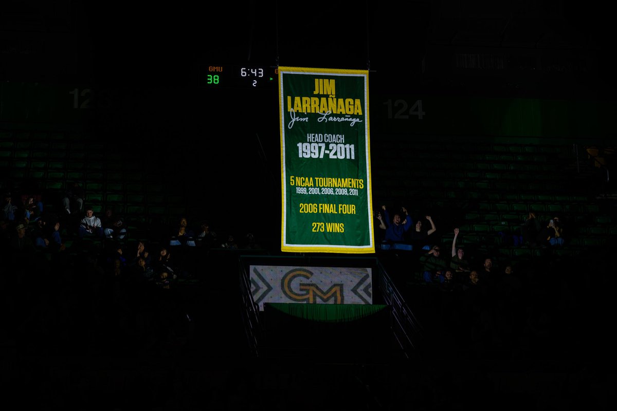 CoachTonySkinn's tweet photo. Today was bigger than a game.

When I first took the job at George Mason, I wanted to make sure we did something to honor the man and the team that changed George Mason University. 

Being able to honor a Coach and Team that helped build the foundation of Mason basketball was surreal.

Now, Coach L’s legacy will hang forever in EBA right where it belongs: Across from the banner we raised 20 years ago.

Thankful for everyone who was able to make this weekend happen. @CanesCoachL #PatriotPressure