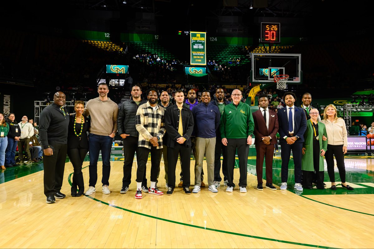 CoachTonySkinn's tweet photo. Today was bigger than a game.

When I first took the job at George Mason, I wanted to make sure we did something to honor the man and the team that changed George Mason University. 

Being able to honor a Coach and Team that helped build the foundation of Mason basketball was surreal.

Now, Coach L’s legacy will hang forever in EBA right where it belongs: Across from the banner we raised 20 years ago.

Thankful for everyone who was able to make this weekend happen. @CanesCoachL #PatriotPressure