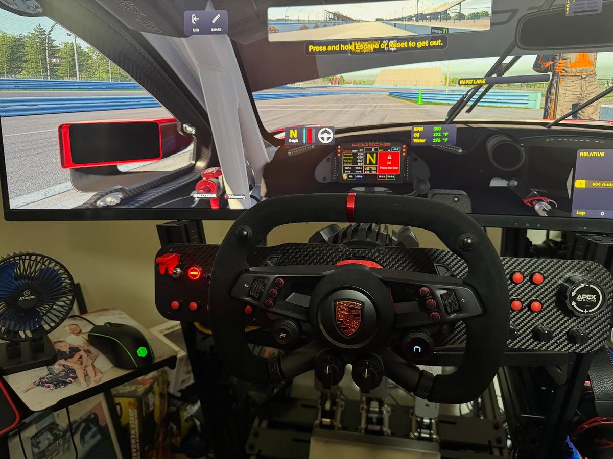 fanatec's tweet photo. Andrew scooped up the CSL Elite Porsche Vision GT and set it up in his rig recently! Plus, he has a creative wheel storage solution built in 👀

📸: hamilton_sim_racing via IG https://t.co/de1yC08kMs