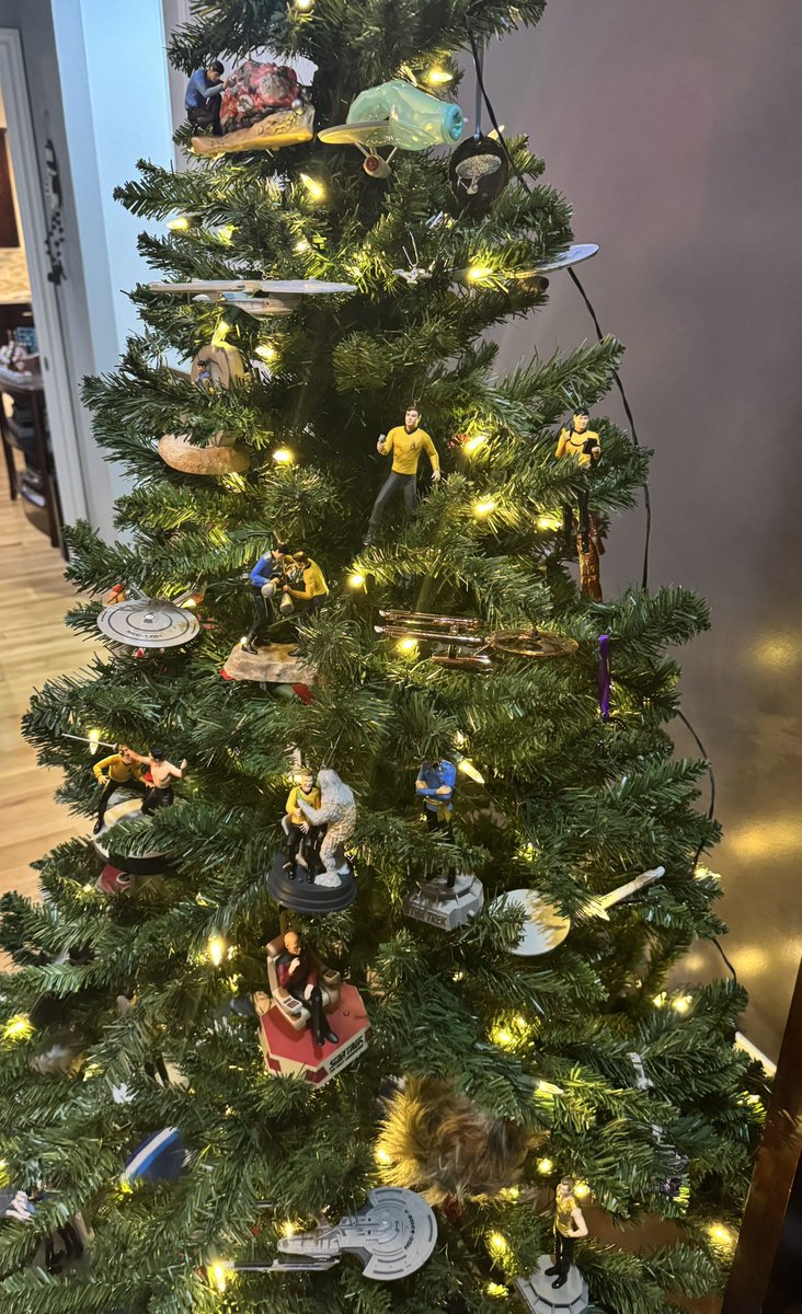 hwoodminotaur's tweet photo. Some away missions and an unexpected stop into the mirror universe caused a delay setting up my #Trekmas tree this year. But you are now free to now set your phasers to merry, I have 62 Star Trek ornaments on my Trekmas tree this year! ๐๐ฝ https://t.co/BFElAgUtMS