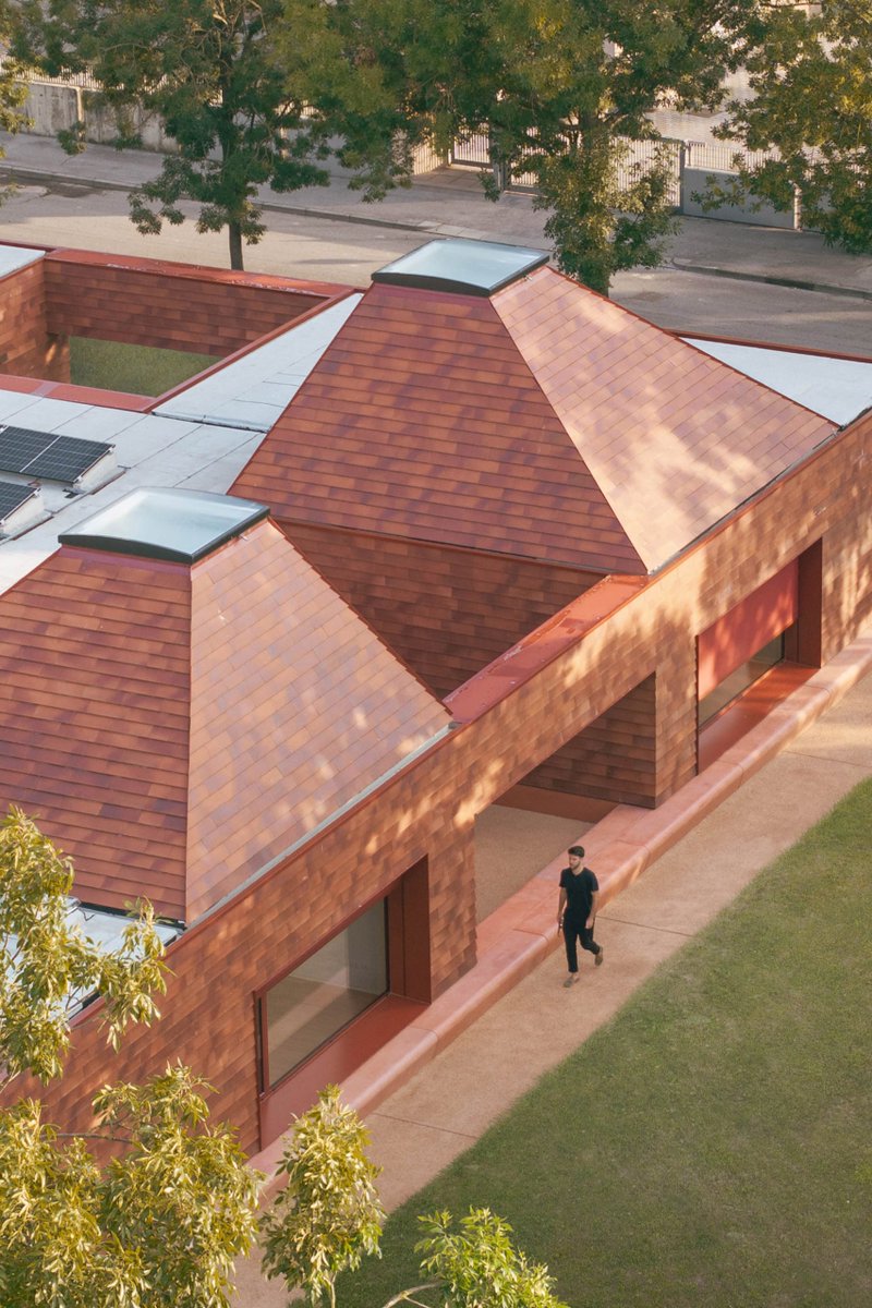 dezeen's tweet photo. AACM designs kindergarten in Italy to feel like "a small village": https://t.co/otCpYEMDb2 https://t.co/ciEJCPz4hA
