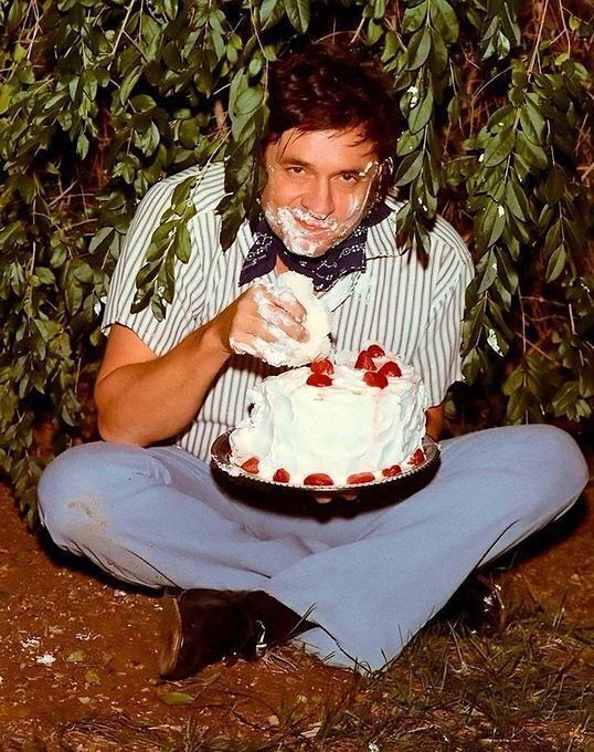 Johnny Cash smears birthday cake all over his face, 1971. Photo by Chance Martin. The picture was later used for the back cover of his 1976 live album, Strawberry Cake. The album's title track was inspired by an incident where Cash saw a homeless man in Central Park and