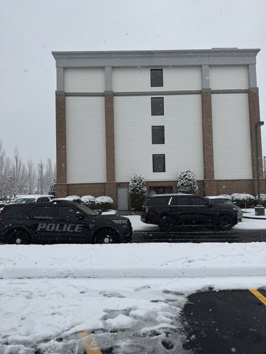 AButtacavoliTV's tweet image. I was allowed inside briefly to this Hampton Inn hotel in Coventry where law enforcement detained the person of interest in the Brown University shooting. I saw caution tape blocking the hallway on the first floor and officers going into a room. ATF, FBI, and Coventry PD here.
