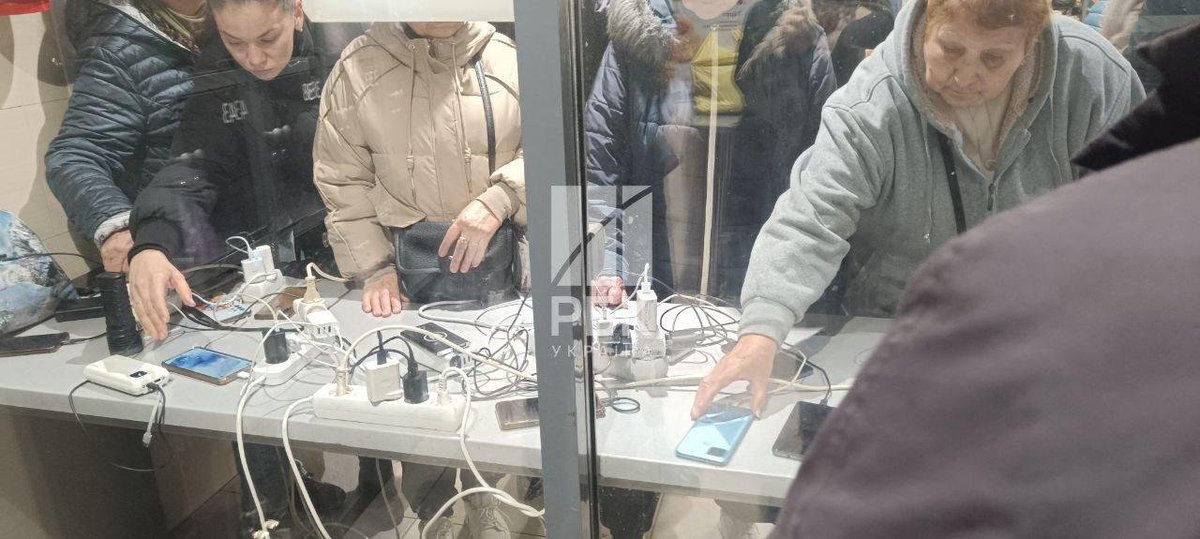 Odesa enters second day of blackout with local resilience points crowded by people charging devices and preparing hot meals.