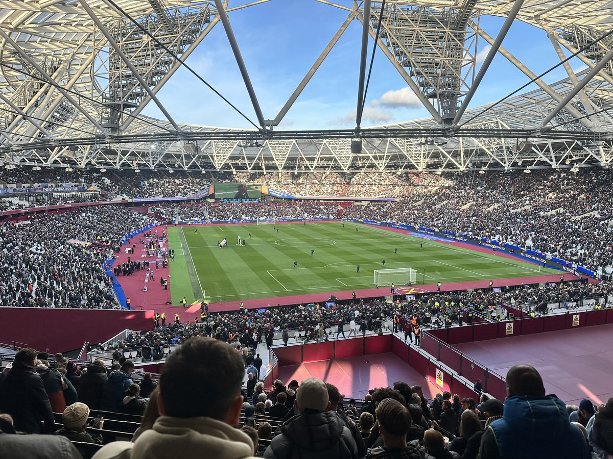 God_B91's tweet photo. 1st time in West Ham’s away end. Weirdly quiet away atmosphere, not helped by conceding after 40 seconds.  It’s true though, terrible stadium, hard to create an atmosphere when you feel so far away from rest of fans when in the same stand (see red empty platforms in photo) #avfc https://t.co/HnRu9g04Of