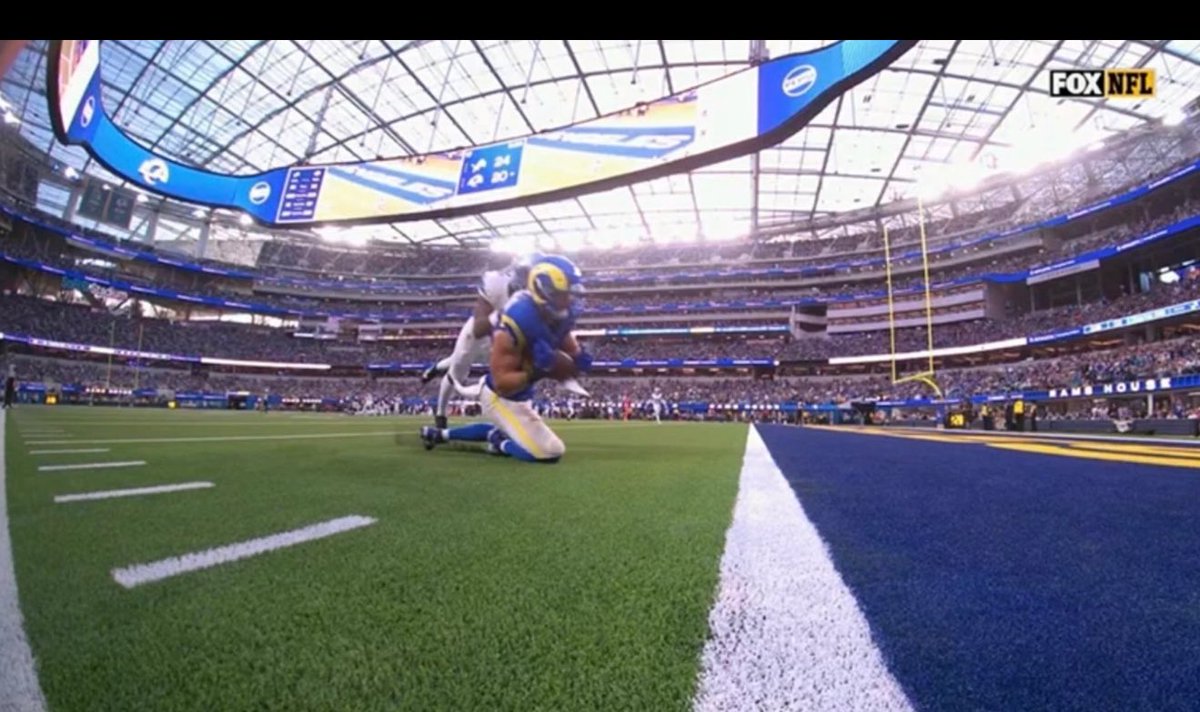 Fully convinced the NFL is rigged. Was skeptical but not anymore. Neither hand is on the ball and clearly short of endzone, goes to the ground and ball is on the ground. After REPLAY ASSIST, this is a TD….that’s by definition an incomplete pass.