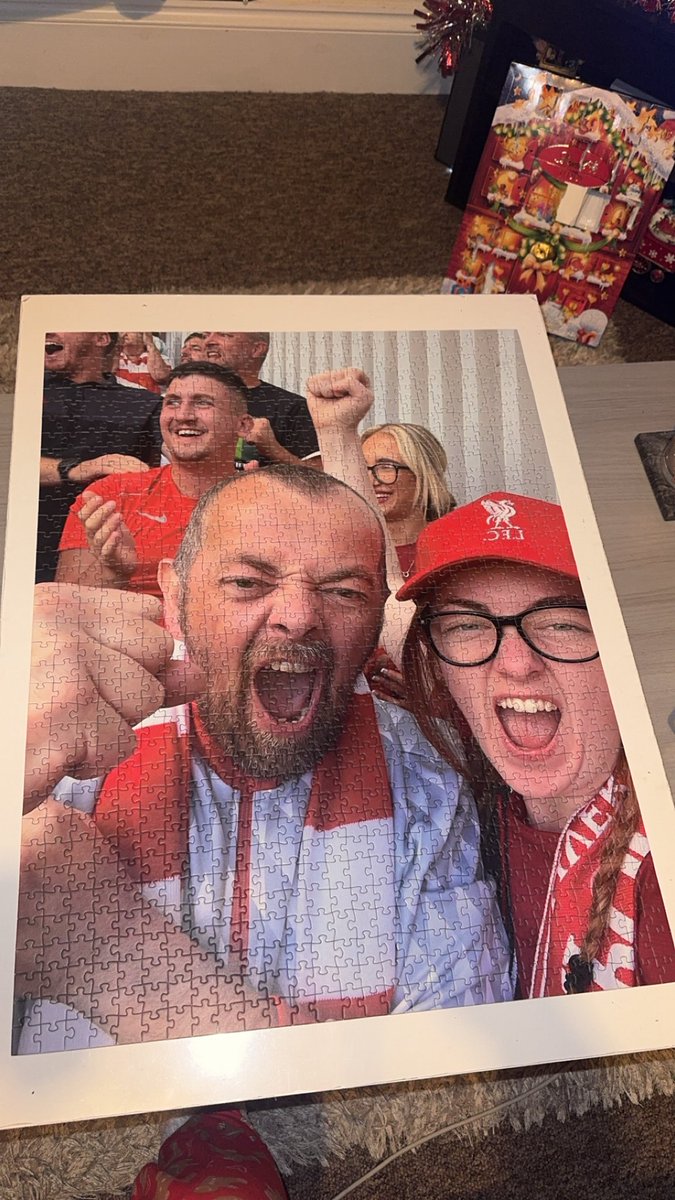 AstonsPrincessx's tweet photo. Just completed this 1000 piece puzzle of me and my dad during a game at Anfield ❤️

Ps: if anyone knows the couple in the background, they got chucked out for vaping💔 https://t.co/dydWSOtQMS