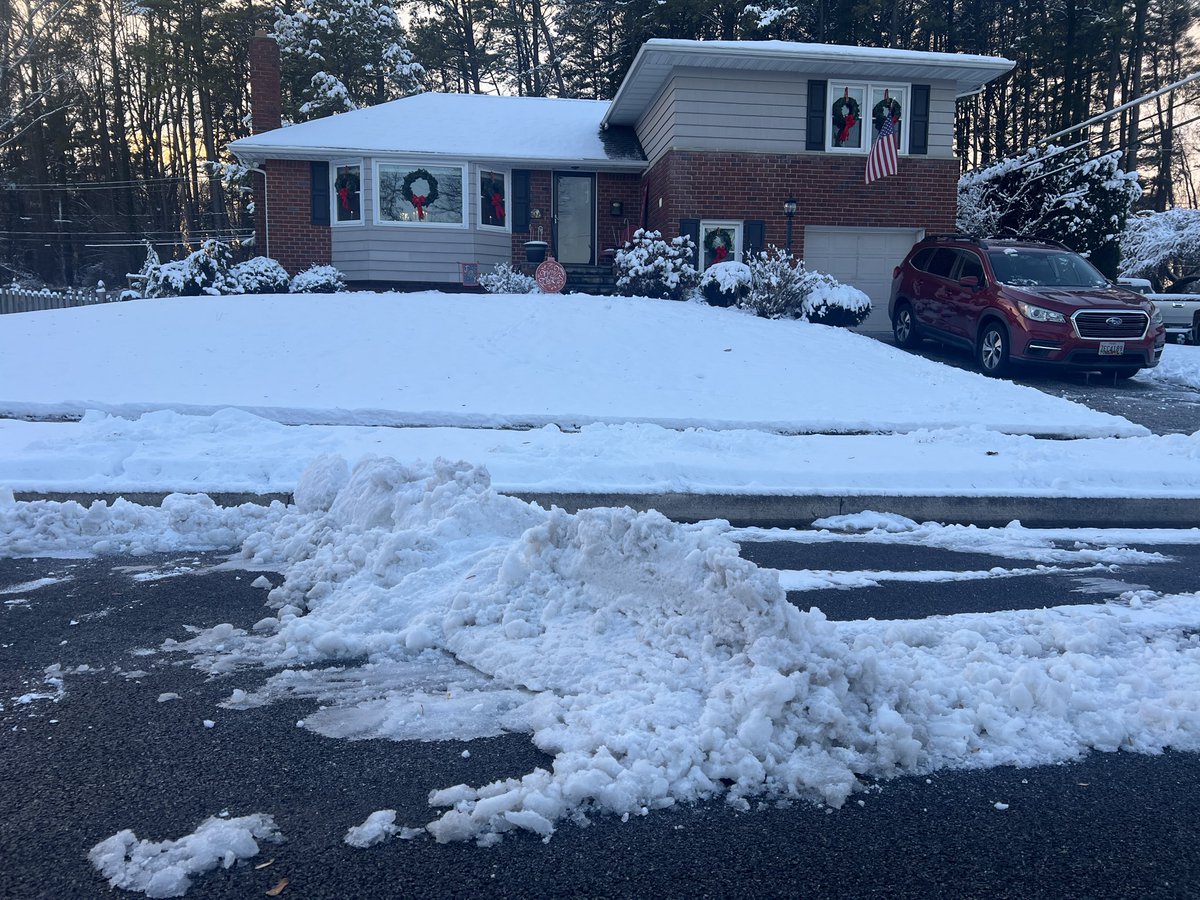 bryantbarr's tweet photo. I would like to thank @BaltimoreCounty for plowing the streets of Campus Hills…and for leaving this iceberg in front of my house.  Anybody got a jackhammer?  (And no, there were no cars parked on the street) https://t.co/0GzKa5DnBP