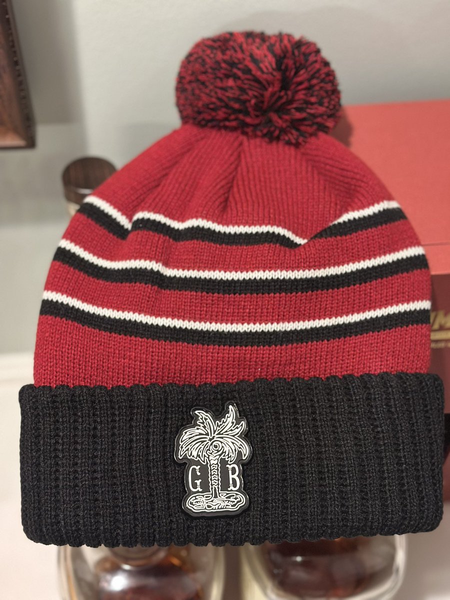 GamecockBourbon's tweet photo. **Christmas Giveaway**

Gifts:
1. Doc Holliday Zippo
2. Doc Holliday
3. Gamecock Bourbon Beanie (hat)

To enter:
1.  Like this post
2. Tag 2 friends
3. 2 entries if you share this post

If you’d prefer a hat instead of the beanie, go over to https://t.co/VsARdf9OpC and you can pick a hat instead.  These new beanies are solid though 🔥
