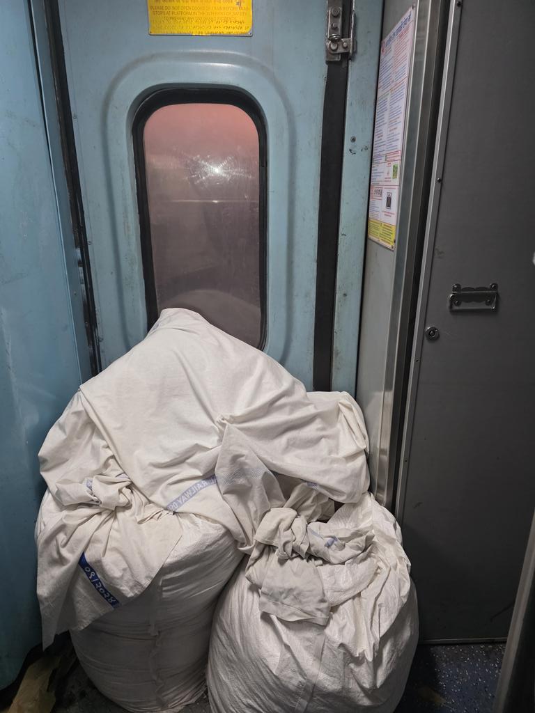 Im_Roohit's tweet photo. @Central_Railway @WesternRly @RailMinIndia Travelling in 12134 down Mangalore Cstm express in coach A2 and I am seeing this door blocked by railway team can you pleas explain why this blocked and what if any emergency occurs. https://t.co/OMxOpS6NS9