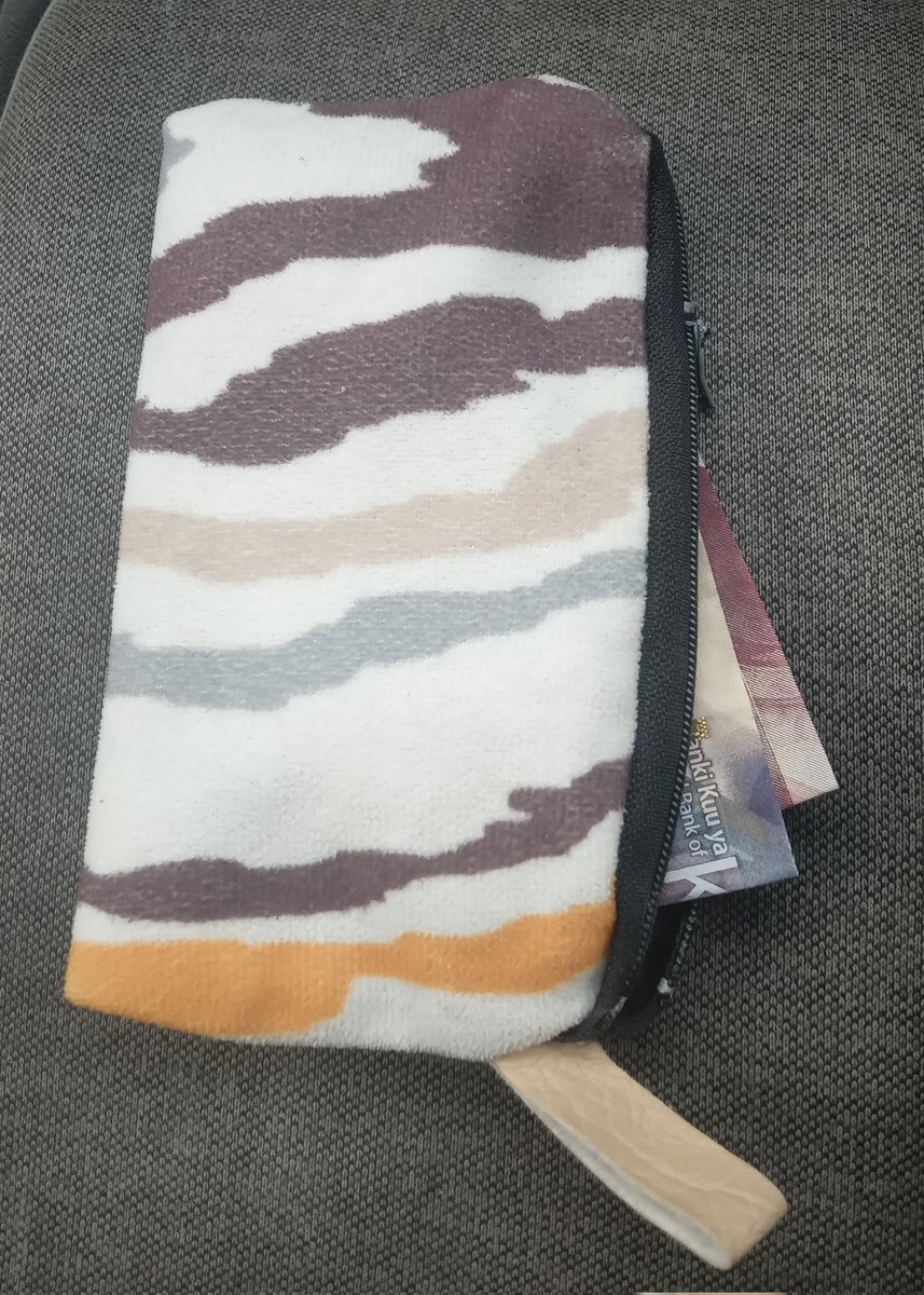 I found this lady purse in my jacket and I fear to ask my wife if it belongs to her. What can I do?