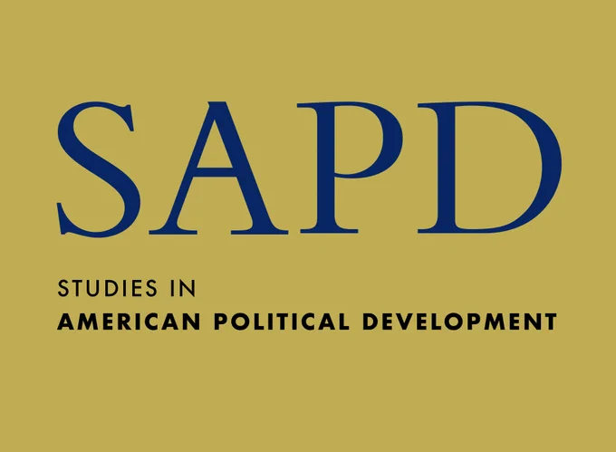Logo of "Studies in American Political Development" featuring the acronym SAPD in large blue letters on a gold background, with the full title written in smaller text below.