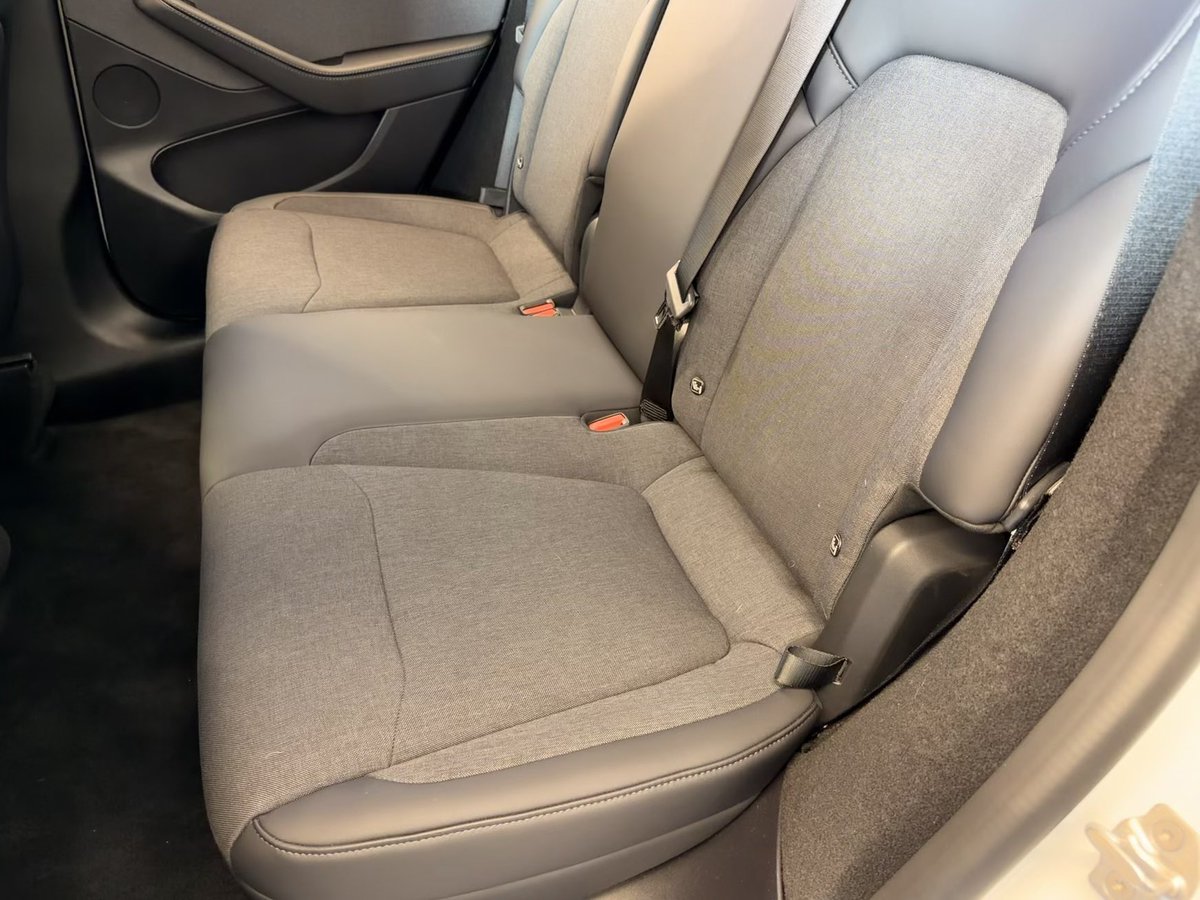 “Low-cost” Model Y isn’t cheaper — it’s stripped

Less leather.
More fabric and hard plastic.
Minimal trim in the trunk and frunk.

Nothing broke.
Nothing important was removed.

Tesla simply cut materials that don’t improve
performance, safety, or efficiency.

Old Model Y tried