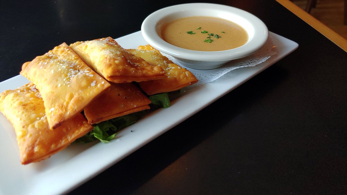 Craving something unforgettable? 😋 Dive into our fan-favorite Blarney Puffs. Each bite is a perfect blend of cheddar, scallion, potato and Guinness cheese sauce. Trust us, they're worth every bite! 🥟 #BarleyHouseEats #BlarneyPuffsLove