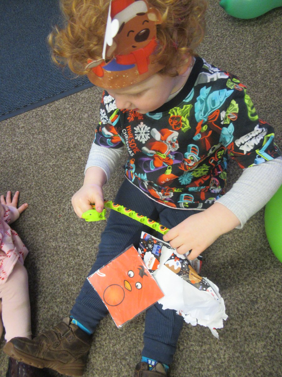 The children were super excited to take part in pass the parcel, waiting their turn, listening to the music and waiting for it to stop xx