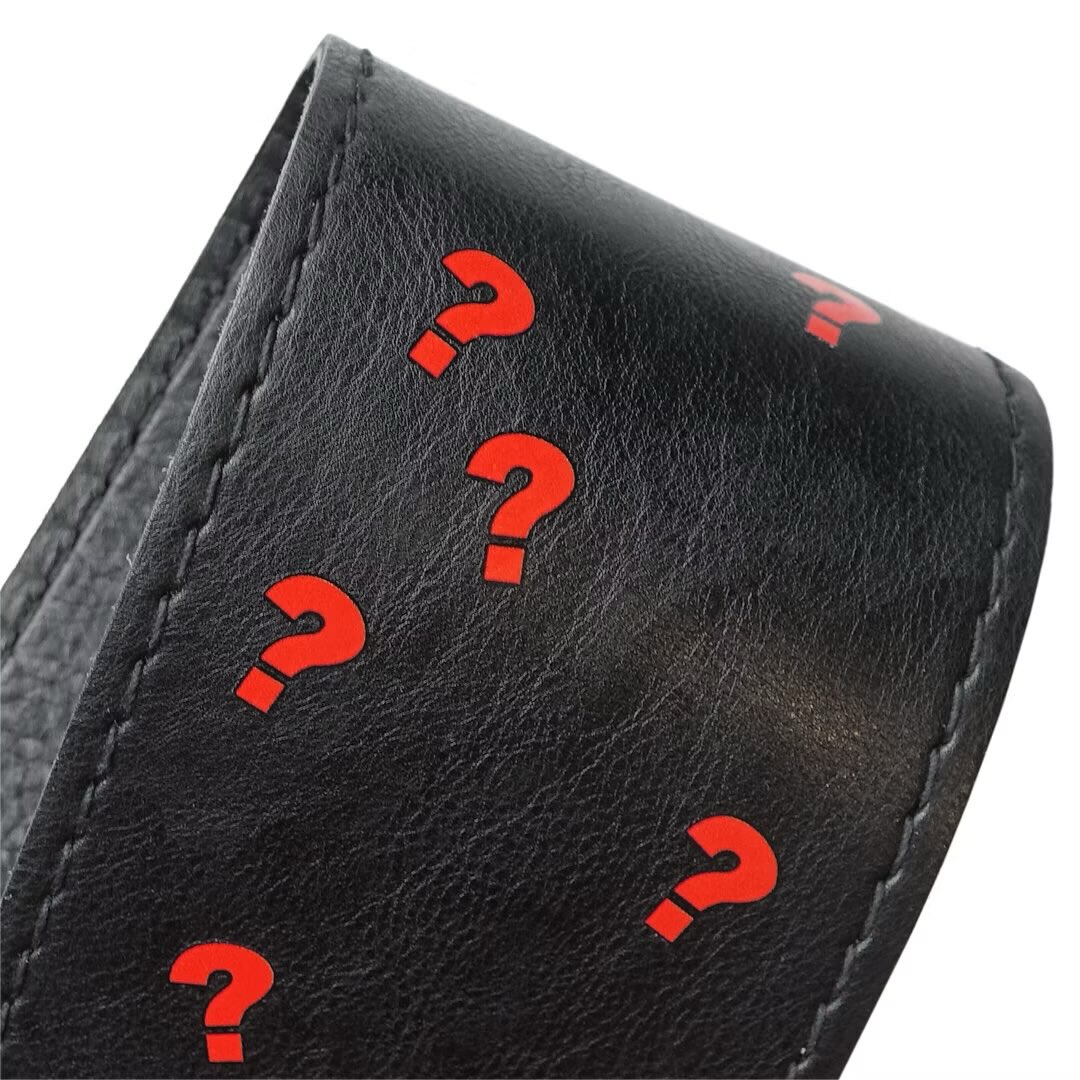 In collaboration with Richter, III designed a signature special edition bass strap, adorned with bright red question marks. 

First witnessed on the European and United Kingdom tour of 2024, it is now available for purchase: richterstraps.com/en/p/iii-signa…