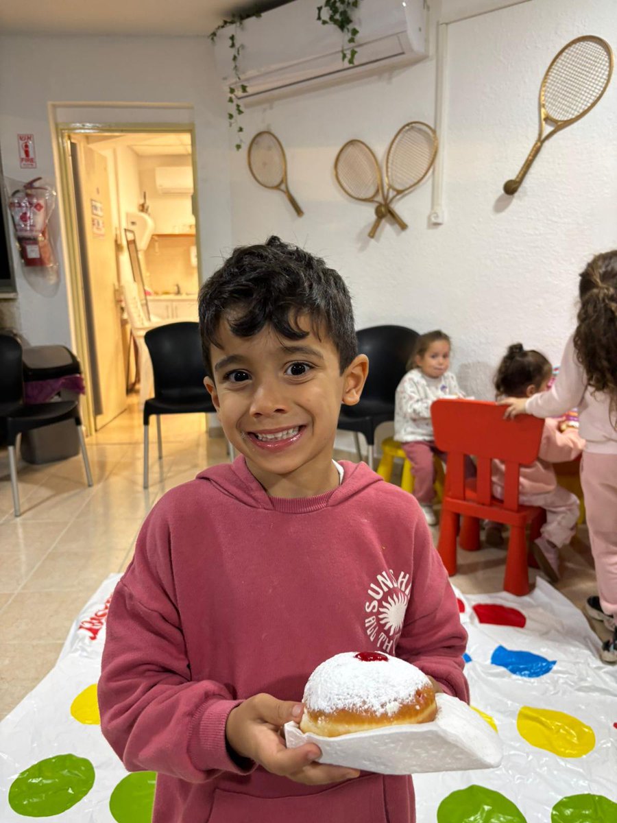 ITECFoundation's tweet photo. Hanukkah joy, one powdered sufganiyot at a time 🍩✨ 

Sweet moments at our centers as we celebrate the Festival of Light. https://t.co/H96nF97inf