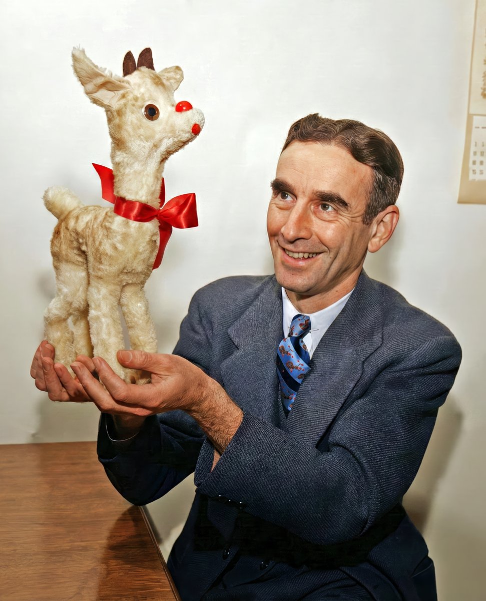 TonyDiTerlizzi's tweet photo. Near the end of America’s Great Depression an ad-writer created a Christmas classic that has been cherished by millions, as well as this big kid.

Robert L. May bounced around from job to job, due to budget cuts from the financial strain from the Depression. May and his family moved to Chicago in 1936, where he was hired as an in-house copywriter for the department store chain, Montgomery Ward.

During the holiday season, the stores offered a gift-with-purchase, which had been coloring books, however; for 1939 they wanted to give an original storybook instead and May was asked to write it. Throughout that year, he crafted his Christmas poem while working with in-house illustrator, Denver Gillan...although that July, May’s wife, Barbara, lost her battle with cancer.

After Barbara’s passing, May’s boss offered to relieve him from finishing the book but May carried on as his daughter loved the story. That December, against the backdrop of WWII, over 2 million copies of “Rudolph the Red-Nosed Reindeer” were given away to delighted shoppers across the country.

After the war, Montgomery Ward’s CEO gifted the rights to Rudolph to May—even though he had created the book as a company employee. May reached out to his brother-in-law, songwriter Johnny Marks, in hopes that he could pen a Christmas song based on the book. In 1949, legendary cowboy singer, Gene Autry, released the smash hit “Rudolph the Red-Nosed Reindeer”. And, as we sing every year about ol’ Rudy, “you'll go down in history”.🦌