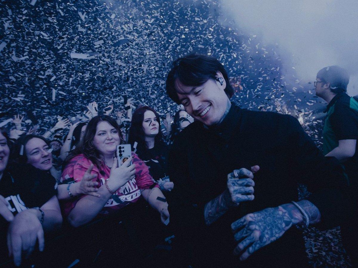 SOTSPodcast's tweet photo. Noah Sebastian (Bad Omens) feels the love from the crowd in new performance photo from the band's show in Amsterdam.

📷 @BryanKirks https://t.co/t9NKX50H4d