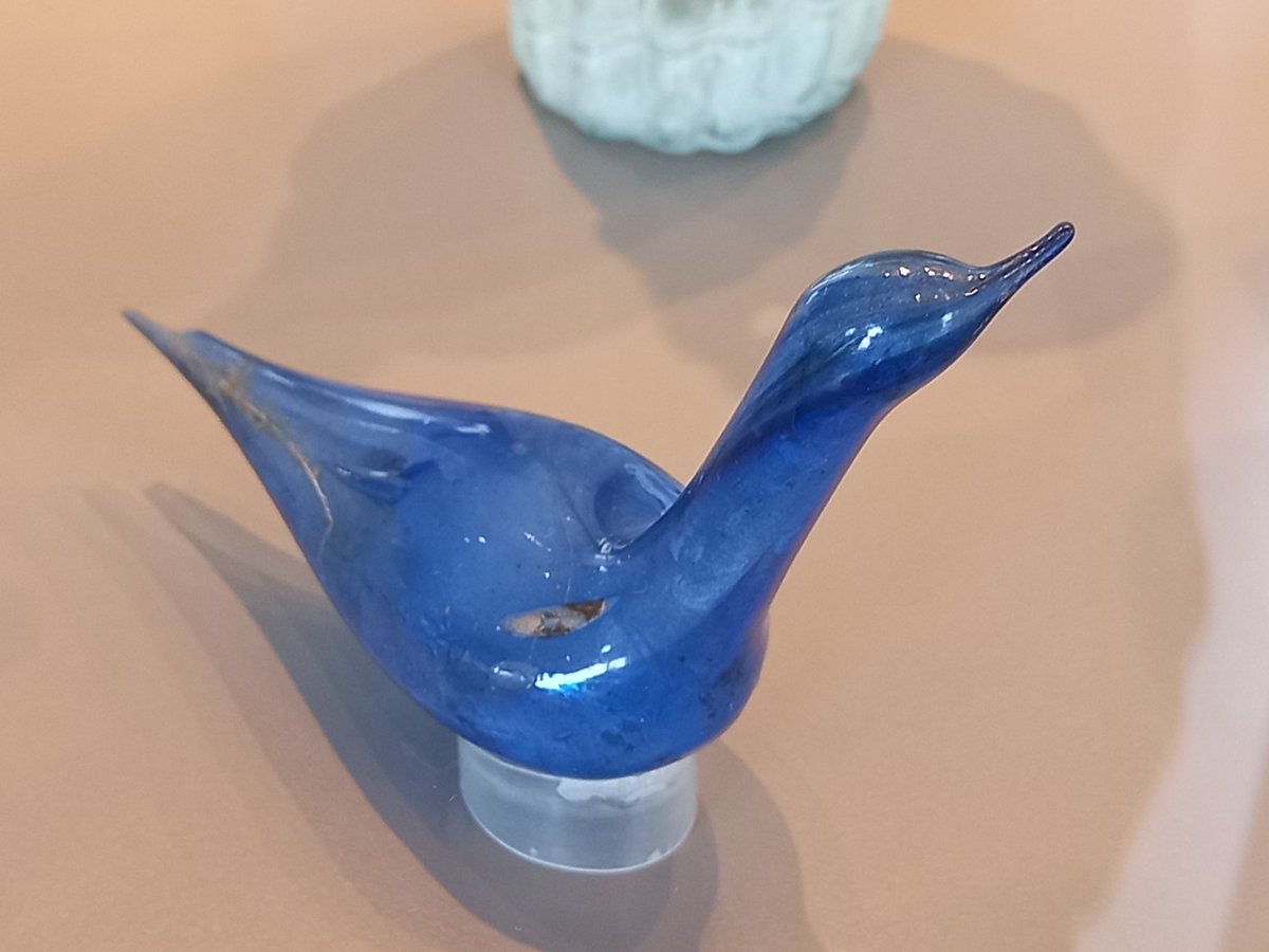 A delicate #Roman glass bird, in a lovely shade of cobalt blue: it would originally have held perfume.
